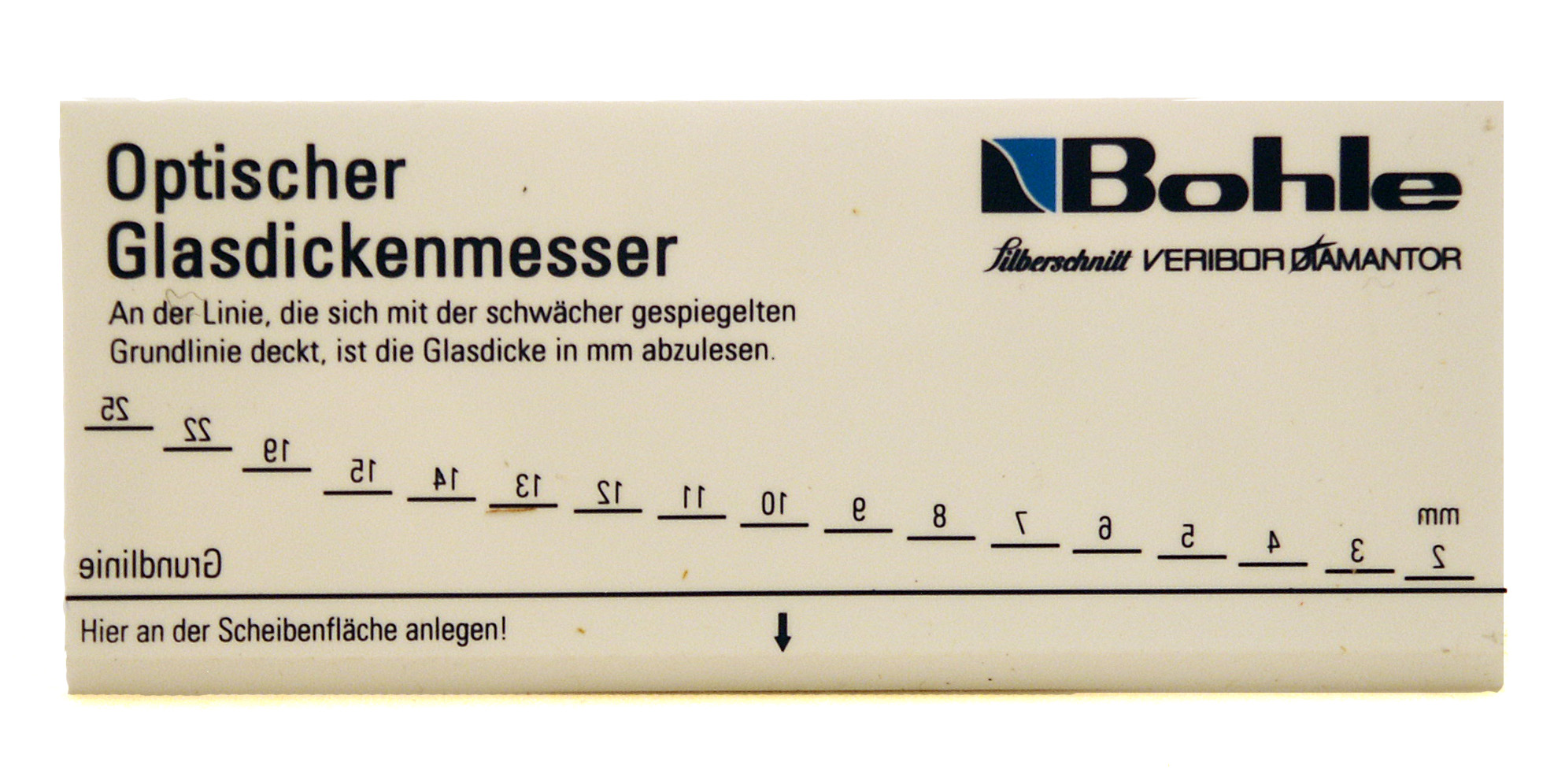 Optický měřák tloušťky skla